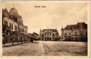 1923 Léva, Levice; Városháza, Városi szálloda, Barsmegyei népbank, Holzmann Bódog, Vámos Mór, Kovács Sándor, Borcsányi és Csernák üzlete. Kiadja Rud. Grof / street view, town hall, hotel, shops, bank (fa)