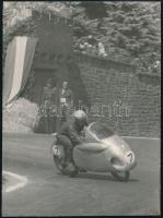 1956 Tihany, motorkerékpár-verseny, Szalkay B. versenyző verseny közben, hátoldalán feliratozott fotó, 12x9 cm / Motorcycle race, photo, 12x9 cm