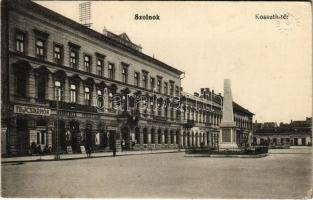 1914 Szolnok, Kossuth tér, tejcsarnok, Dr. Szegő fogorvos, Perlesz Lajos, Boros Béla és Lehoczky Mihály üzlete, Honvéd szobor, Külső Szolnok Megyei takarékpénztár. Gerő Ignác kiadása 2651. (EK)