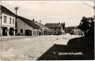 Lippa, Lipova; Piata Unirii, Jacob Schwartz és fiai üzlete / Fő tér / main square, shops. Foto Steinitzer photo (EB)