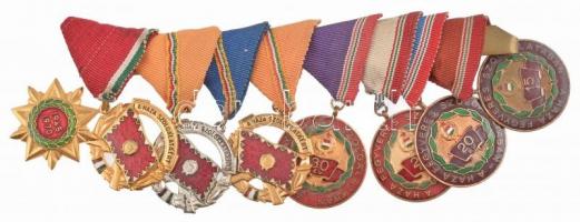 1964. A Haza Szolgálatáért Érdemérem arany (2x) és ezüst fokozata, zománcozott, aranyozott Br és ezüstözött Br kitüntetések mellszalagon + 1965. Szolgálati Érdemérem - A Haza Fegyveres Szolgálatában 15, 20, 25, 30 év 4db zománcozott kitüntetés mellszalagon +  1970. Felszabadulási Jubileumi Emlékérem aranyozott, zománcozott bronz kitüntetés mellszalagon, pánton összefűzve T:2,2-