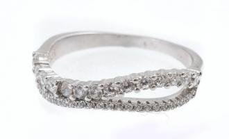 Ezüst(Ag) gyűrű, apró kövekkel, jelzett, néhány kő pótolt, méret: 59, bruttó: 2,7 g