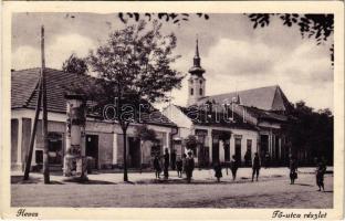 1934 Heves, Fő utca, templom, hirdetőoszlop, Frank Zsigmond üzlete. Polatsek kiadása (EK)