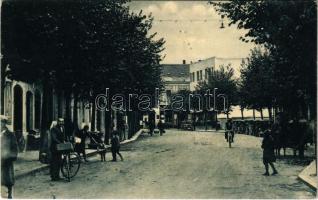 Komárom, Komárno; Barossová ulica / Baross utca, üzletek, automobilok, kerékpár / street view, shops, automobiles, bicycle (ragasztónyom / glue marks)