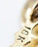 Arany (Au) 18 K brilles mandzsettagomb-pár, kőhiánnyal, jelzett, bruttó: 6,8 g