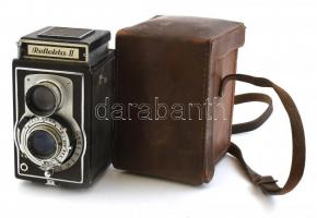 cca 1950 Welta Reflekta II kétobjektíves, tükörreflexes fényképezőgép, ROW Pololyt f75/3,5 objektívvel, eredeti bőr tokjában, kissé kopott / Welta Reflekta II vintage twin-lens reflex camera with ROW Pololyt f75/3,5 lenses, in original leather case, slighty worn
