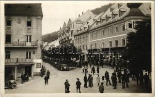 Mariazell (Steiermark), street view, hotel, shops, automobiles. Foto-Anstalt J. Kuss