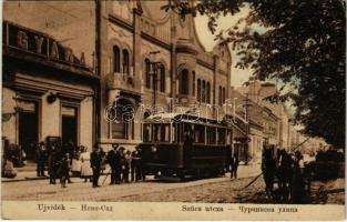 1914 Újvidék, Novi Sad; Szűcs utca, villamos, üzlet. Singer J. kir. montenegrói udvari fényképész / street view, tram, shop (EK)