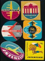 cca 1970 Interflug DDR keletnémet légitársaság, reklámos bőröndcímke, 6 db