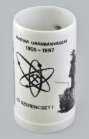 Zsolnay korsó, matricás porcelán, felirat: Magyar uránbányászat, 1955-1997. Jó szerencsét! jelzett, kopásnyomokkal. m: 19 cm