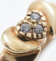 Arany (Au) 14 K szív gyűrű 3 db kővel, jelzett, méret: 54, bruttó: 2,8 g