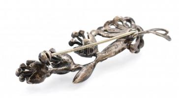 Ezüst(Ag) markazitokkal díszített virágos bross, jelzett, fém tűvel, h: 6,5 cm, bruttó: 9,5 g