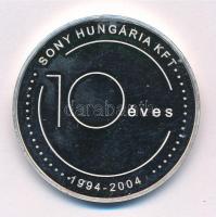 2004. 10 éves a Sony Hungária Kft. 1994-2004 / Sony. Önnel bármire képes jelzett Ag emlékérem (31,52g/0.999/42,5mm) T:1 (eredetileg PP) fo., patina