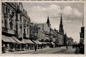 1941 Újvidék, Novi Sad; Kr. Aleksandra ul. / utca, autók, üzletek , hirdetőoszlop / street, automobiles, shops, advertising column (fl)