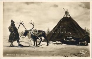 Lapono kun boaco kaj tendo / Nordic Sami folklore, Laplander with reindeer and tent, ski (EK)