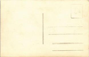 Cserkész a kertben családi körben / Hungarian boy scout in the garden. photo