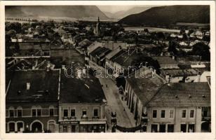 1938 Rozsnyó, Roznava; Bevonulás, díszkapu, Steiner József, Seidl E. és Neumann Lajos utóda Ehrenfeld M. üzlete / entry of the Hungarian troops, decorated gate, shops