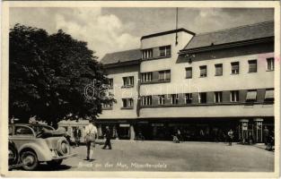 1940 Bruck an der Mur (Steiermark), Minoritenplatz / square, automobile, gas station, shops + "Oberkommando der Wehrmacht Geprüft"