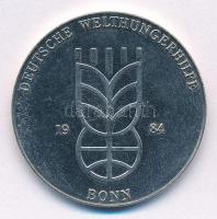 Németország / NSZK 1984. Deutsche Welthungerhilfe - Bonn kétoldalas fém emlékérem (32mm) T:2 karc Germany / GFR 1984. Deutsche Welthungerhilfe - Bonn two-sided metal commemorative medallion (32mm) C:XF scratch