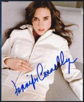 Jennifer Connelly (1970-) amerikai színésznő aláírása az őt ábrázoló fotón