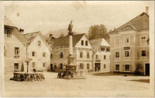 1930 Mautern in Steiermark, Brunnen, Hauptplatz, Mariensäule, Vorschusskassen Verein der Pfarrgemeinde, Sepp. Lackner / main square, well, shop, statue, bank. photo