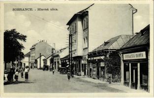 1934 Szobránc, Sobrance; Fő utca, Duna Bank, üzletek, autó. Foto J. Sobek / Hlavná ulica, Dunajská Banka / main street, bank, shop, automobile