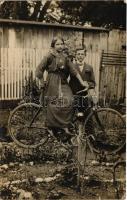 Lány és fiú biciklivel / girl and boy with bicycle. photo (EK)