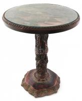 Dekoratív orientalizáló asztalka, dohányzóasztal, jelenetekkel, motívumokkal gazdagon díszített, román gyártmány, XX. sz. második fele. Faragott fa hatású, azonosítatlan anyagból (feltehetőleg műgyanta), tetején üveglappal, kopásnyomokkal, d: 40 cm, m: 48 cm