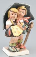 Hummel: Esernyős figura, kézzel festett fajansz, jelzett, kopásnyomokkal, mázrepedésekkel, sérült, ragasztott. m:13cm