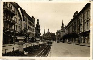 1942 Kolozsvár, Cluj; Horthy Miklós út, Minerva biztosító, üzletek / street view, insurance company, shops, automobile (EK)
