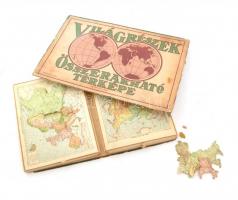 Világrészek összerakható térképe, kirakós játék (puzzle), 1930-1940 körül, Kókai Lajos kiadása. Fa, papír, karton, hiányos, eredeti sérült kartondobozában, egyes táblák mérete kb. 28x22 cm.