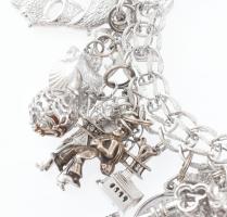 Ezüst (Ag) karlánc, sok kis függő figurával, zsuzsuval. Jelzett 102 g