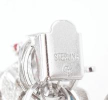 Ezüst (Ag) karlánc, sok kis függő figurával, zsuzsuval. Jelzett 102 g