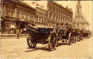 1915 Újvidék, Neusatz, Novi Sad; Német tüzérség a Fő utcán, Nikolits M. és Miroszavlyevits testvérek üzlete / WWI German military artillery soldiers on the main street, shops. photo