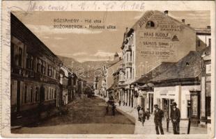 1918 Rózsahegy, Ruzomberok; Híd utca, reklámplakátok (Rózsafüred gyógyfürdő, Haas Rudolf, Vámos Sámuel és Mangold Zsigmond üzlete), cukrászda. Valuch János kiadása / street, advertising posters of shops, confectionery / Mostová ulica