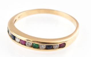 Arany (Au/14k) gyűrű, briliáns csiszolású, gyémántokkal, rubinokkal, smaragdokkal és zafírokkal, brillek össz. 0,12ct. egyéb kövek össz: 0,19ct jelzett, bruttó: 1,9g, m: 54. Certifikáttal.