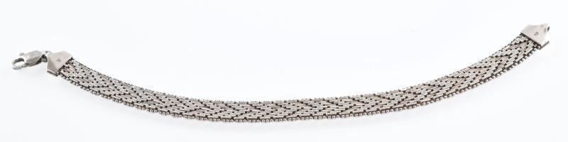 Ezüst (Ag) fonott széles karkötő, jelzett, h: 17,5 cm, nettó: 15,9 g