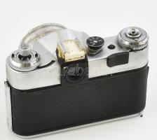 Zenit E fényképezőgép Zeiss Tessar 2,8/50 objektívvel, bőr tokkal. A kamera zárja nem működik, borít...