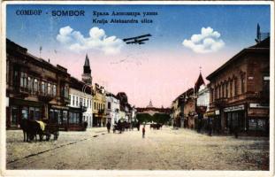 Zombor, Sombor; Kralja Aleksandra ulica / utca fölött egy repülőgép / street, shops, aircraft + "1941 Zombor visszatért" So. Stpl