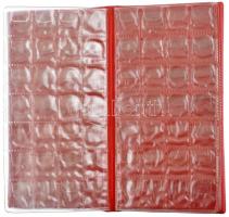 1db piros műbőr érmetartó album, benne 4x28db 2,5x2,5cm-es férőhellyel, használt állapotban