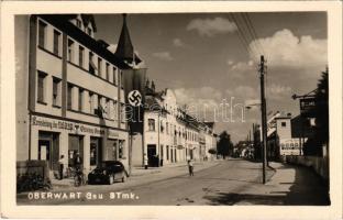 Felsőőr, Oberwart; Kreisleitung der NSDAP Ortsleitung Oberwarth / utca, Nemzetiszocialista (náci) Német Munkáspárt kerületi vezetőségének irodája, horogkeresztes zászló, Andreas Kelemen üzlete, automobil, kerékpár, autógarázs / street view, NSDAP German Nazi Party's district office, swastika flag, shops, automobile, bicycles, auto garage. L. Lottes (Wien) photo