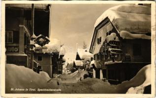 1938 Sankt Johann in Tirol, Speckbacherstrasse, Apotheke, Photohandlung, Shell Pumpe / street in winter, Cafe Rainer, Poststrasse, gas station