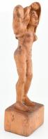 Ü.I. 1987 jelzéssel: Női akt. Faragott fa, repedésekkel, m: 40 cm