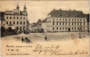 1899 (Vorläufer) Gniezno, Gnesen; Marktplatz mit Domstraße / market square, shops (fl)