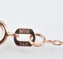 14K arany nyaklánc 12 darab brill gyémánttal ékített függővel
(0,07 ct/VS). Bruttó 1.8 g, 45cm hoss...