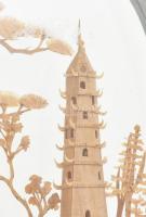 Kínai finom fafaragás üvegezett keretben. 19 cm