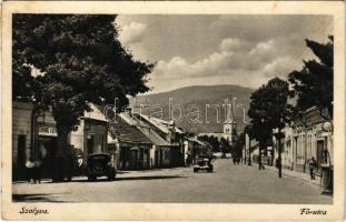 1943 Szolyva, Svalava, Svaljava, Szvaljava, Svaliava; Horthy Miklós utca, autók, üzletek, templom / main street, automobiles, church, shops (EK)