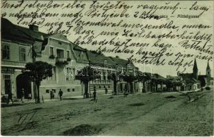 1910 Szászrégen, Reghin; Közép utca, Eduard Theil üzlete. Bischitz J. kiadása / Mittelgasse / street view, shops (EK)