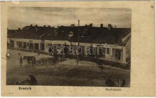 1916 Krasnik, Marktplatz / market square in winter, shops (tear)