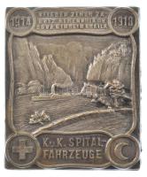 Osztrák-Magyar Monarchia ~1918. K.u.K. Orvosi járműegység 1914-1918 dombornyomott ezüstözött bronz jelvény, Morszány J. Budapest gyártói jelzéssel (40x34mm) T:1-,2 Austro-Hungarian Monarchy ~1918 K.u.K. Medical vehicle unit 1914-1918 embossed silver-plated bronze badge with Morszány J. Budapest hallmark (40x34mm) C:AU,XF